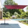 Parasol Déporté Carré Manoa 2.5x2.5 M - Acier Et Polyester - Bordeaux 1 Parasol Déporté Carré Manoa 2.5x2.5 M - Acier Et Polyester - Bordeaux -Petit Coin Vert Magasin parasol deporte carre manoa 25x25 m acier et polyester bordeaux